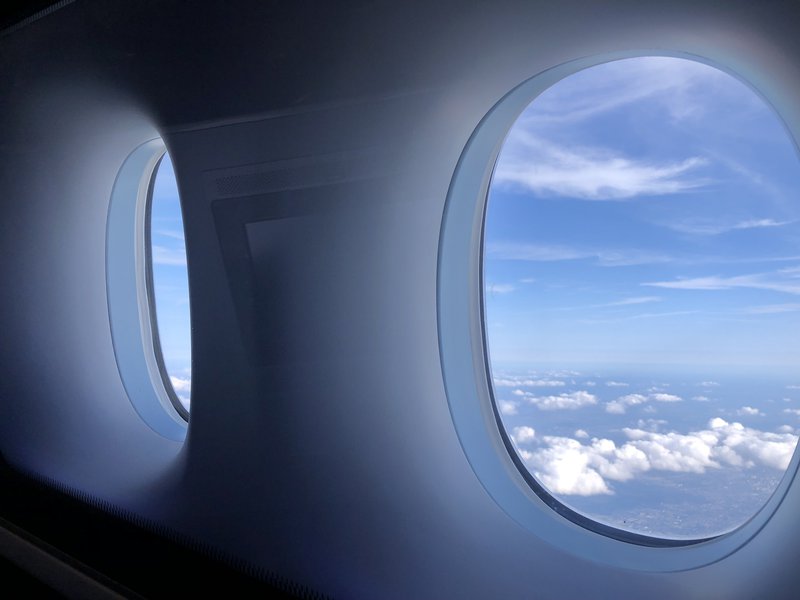 A window seat will snag you not one, but two windows to peek out of.