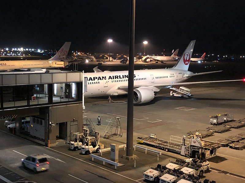 One of JAL&#x27;s B787 Dreamliners preparing for takeoff at Narita airport.