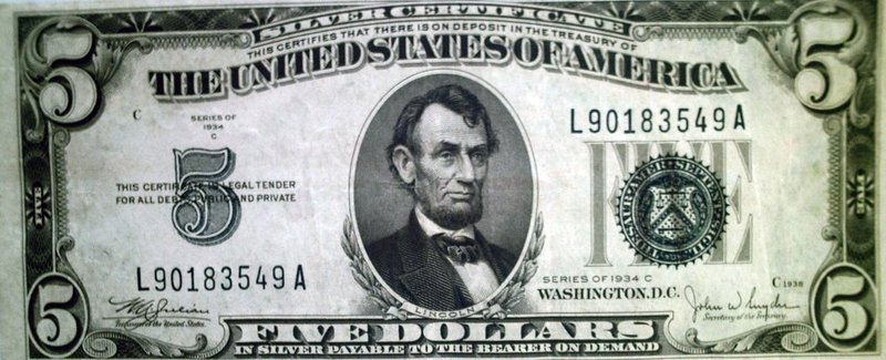 A USD $5 banknote commemorating President Abe Lincoln from 1934. (Image: Maggie Mbroh)