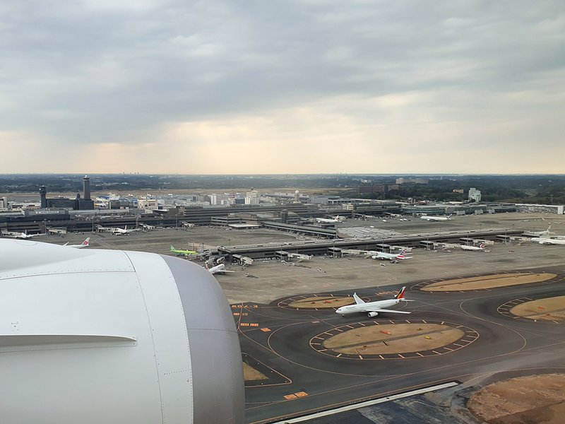 On our final approach to Narita with a Philippines Airlines A330 taxiing below.