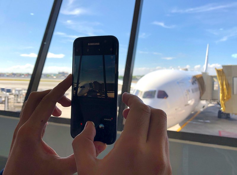 A photo of me taking a photo of our aircraft.